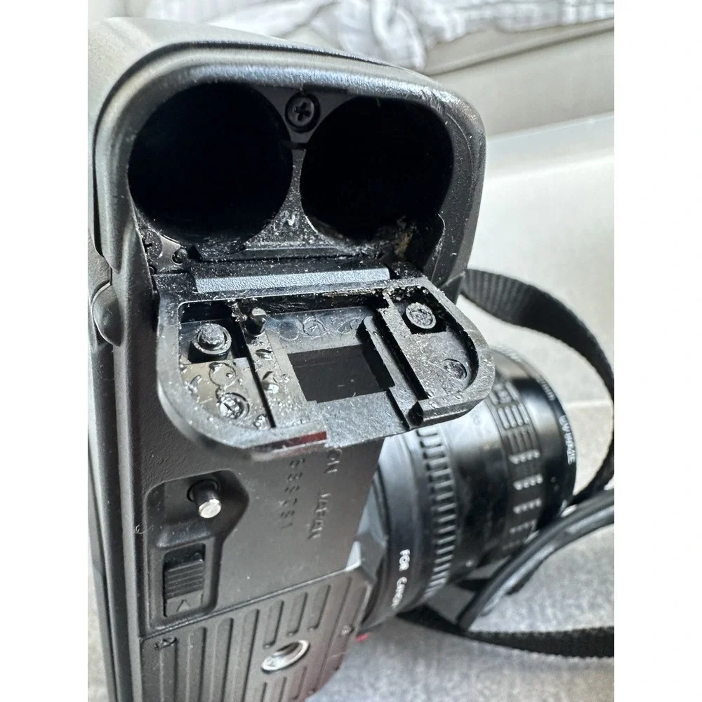 Canon T70 35mm Camera Lot. Body, 3 Lenses, Flash, Bag. Works Great!